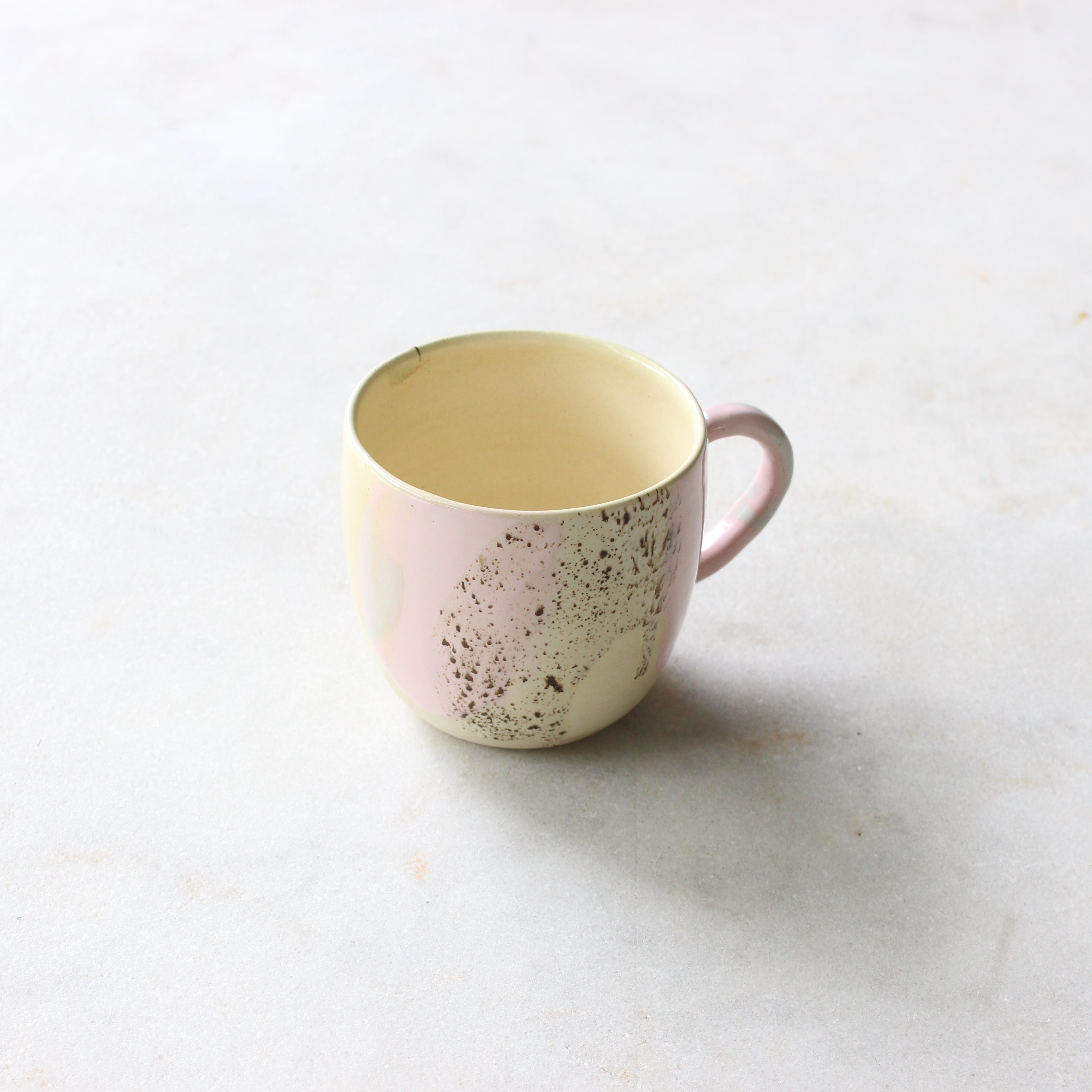 Soft Pastel and speckled stoneware tea cup Ceramics D H Makers 