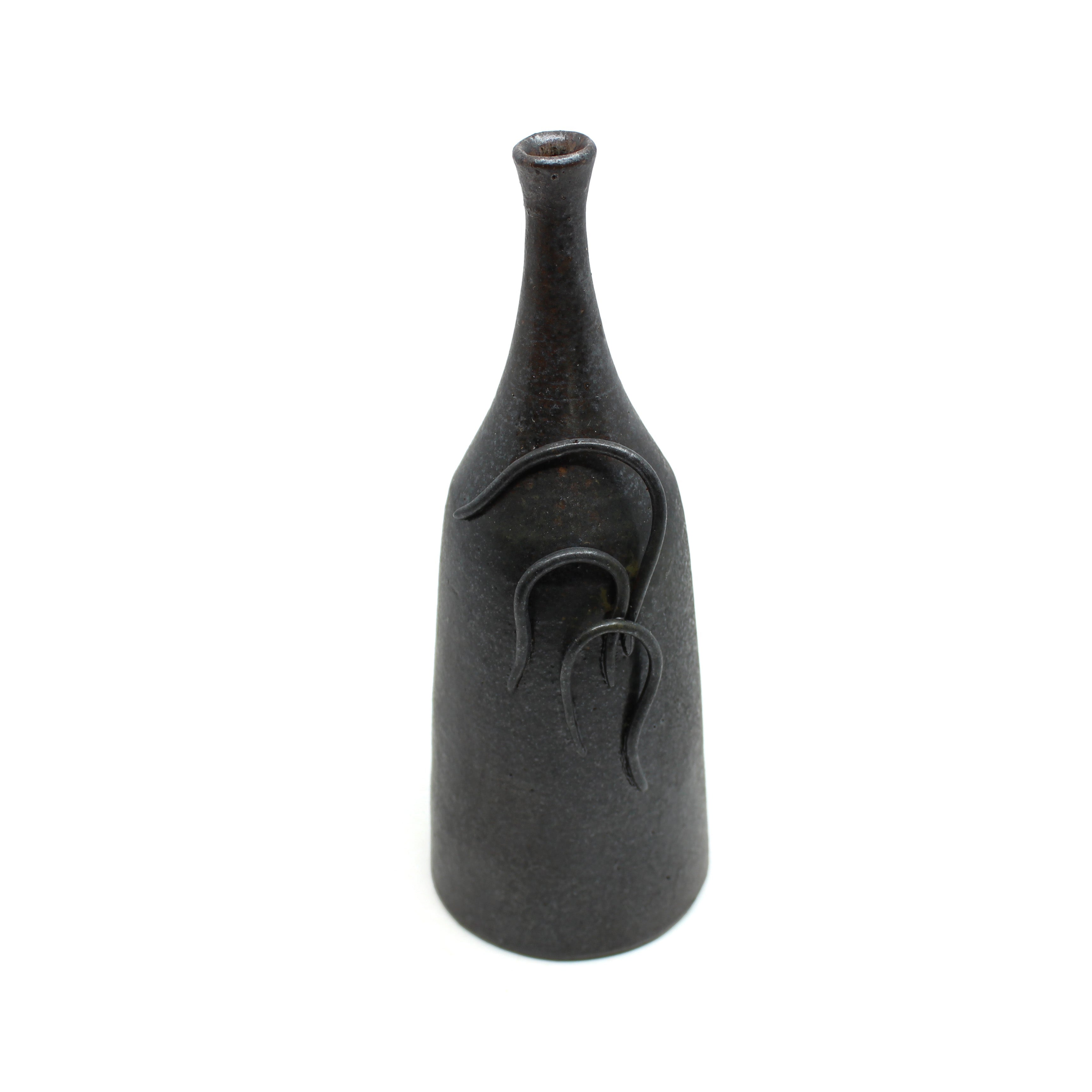 Metal and dust bottle with coils Ceramics Baylee Griffin 