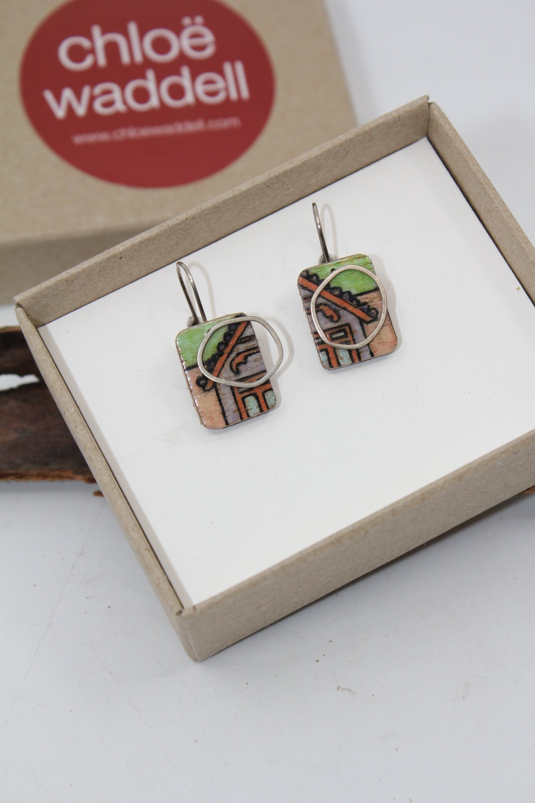 Painted Cityscape ply and silver Earrings Jewellery Chloe Waddell Green Background 
