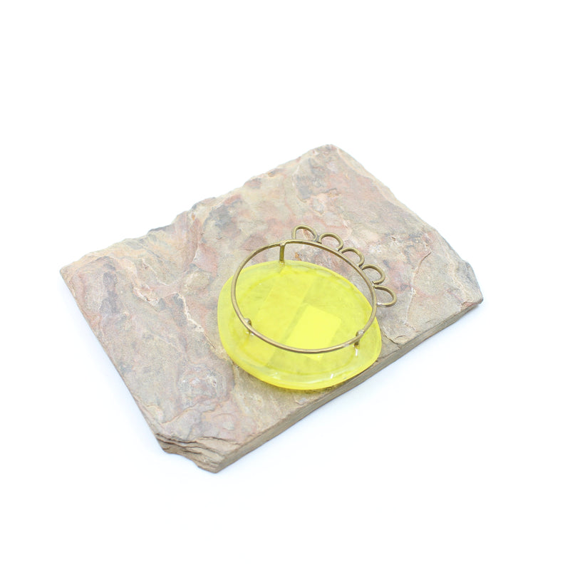 Yellow resin with brass petals brooch Jewellery Jen Eales 