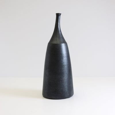 Large Metal and Dust Bottle